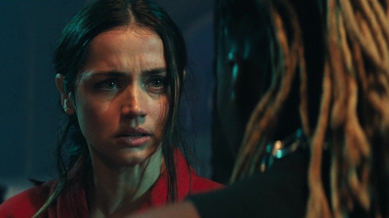 Ana de Armas as Eve looks disheveled as a ballerina
