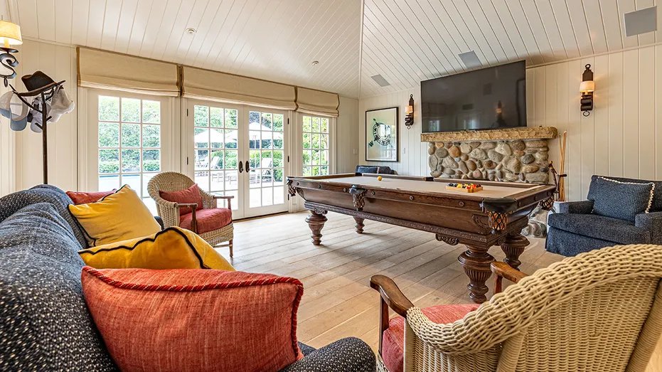The house also includes a games room with a billiards table.