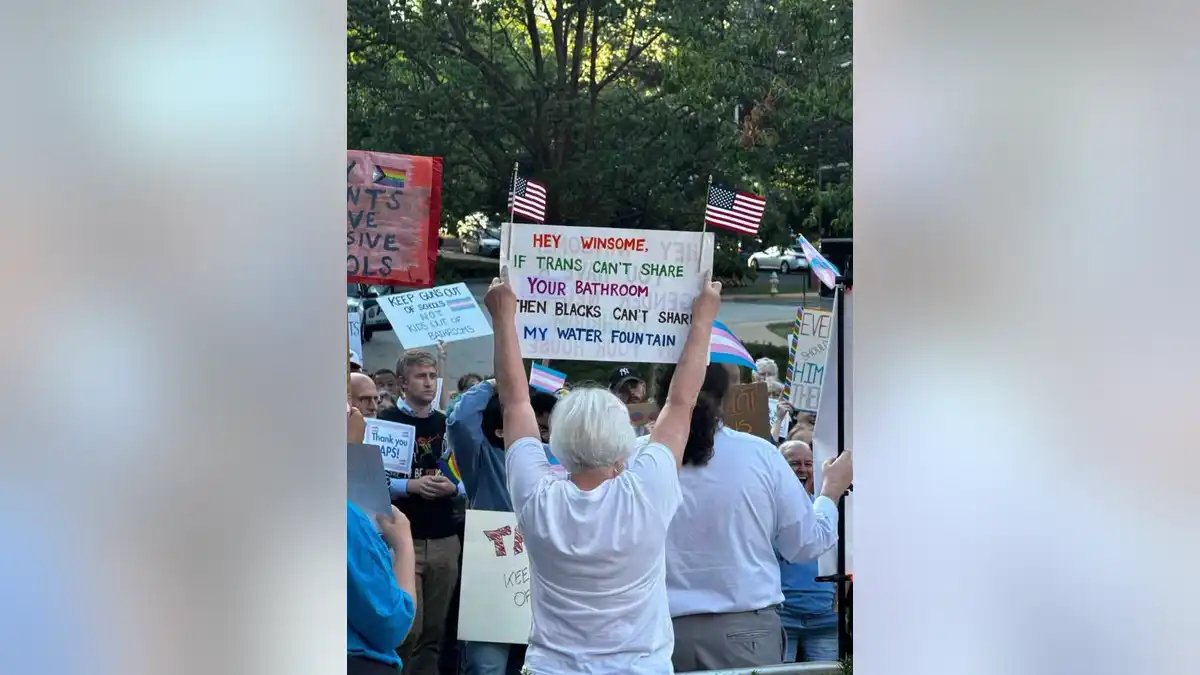 A sign with racially charged language targets the Republican candidate for governor of Virginia