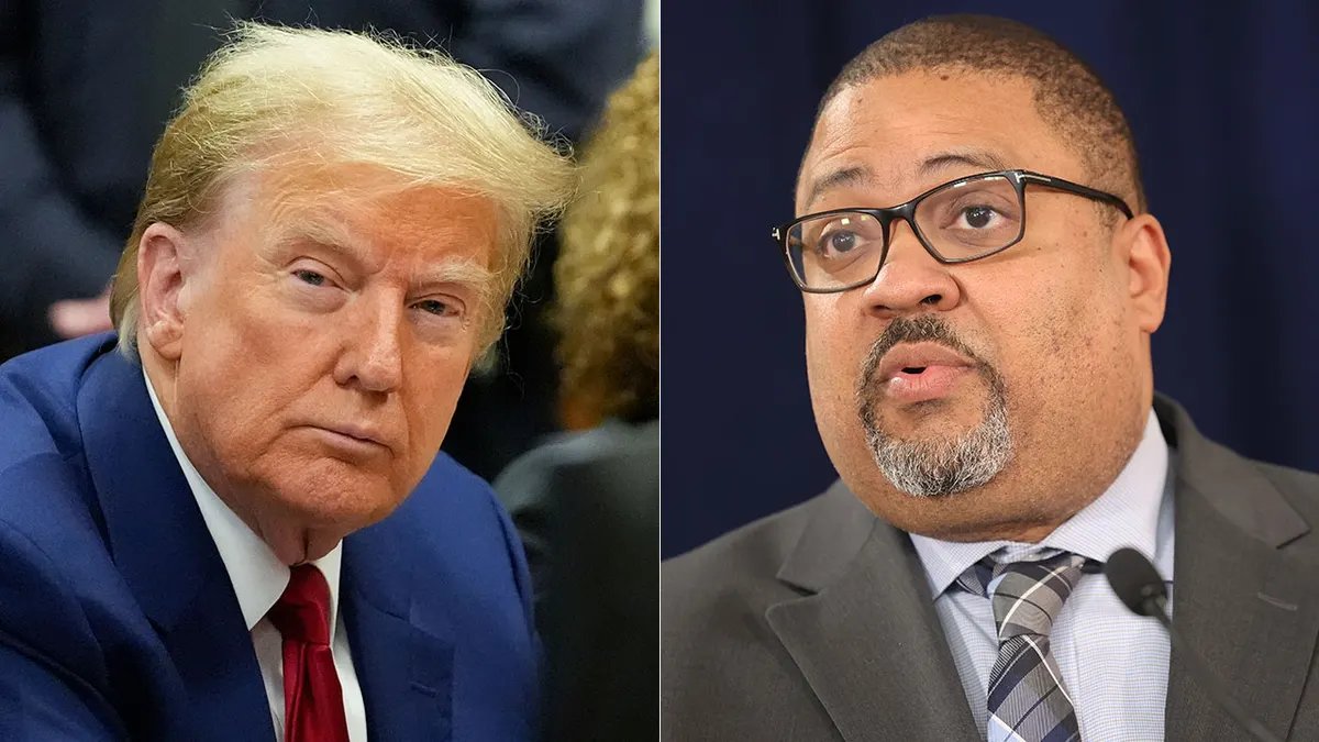 The photo is cropped of Trump and Bragg side by side
