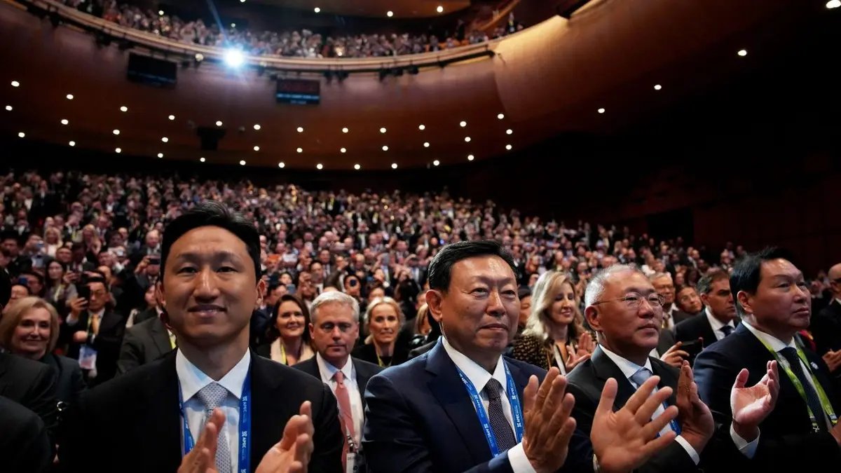 The audience applauds US President Donald Trump
