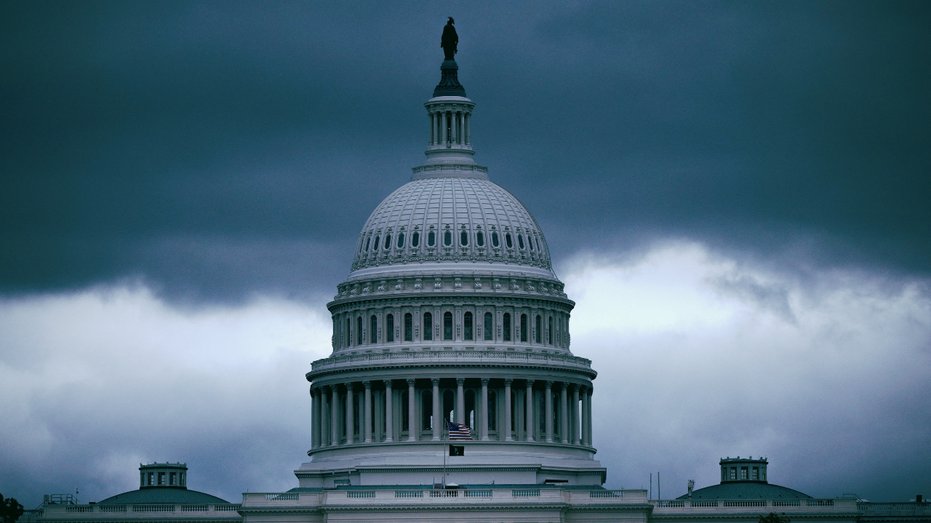 Clouds behind the US Capitol building
