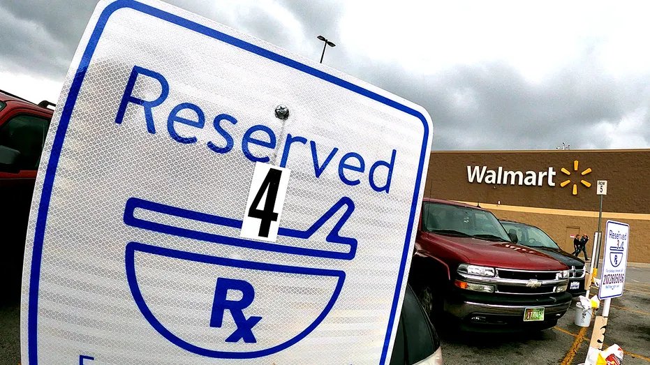 Walmart reserved parking spot sign.