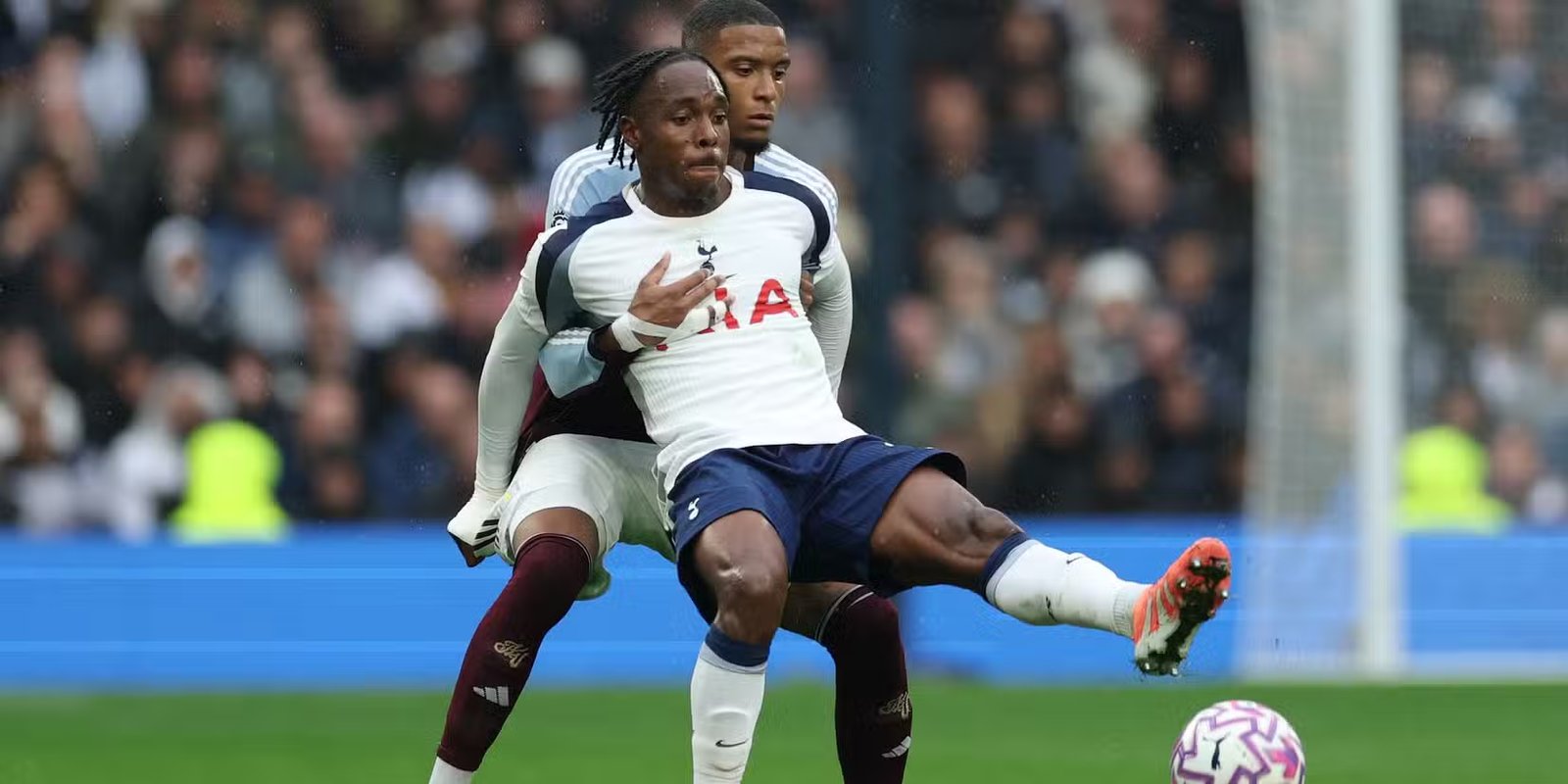 Aston Villa's Ezri Konsa in a match with Tottenham Hotspur's Matthijs Tille 