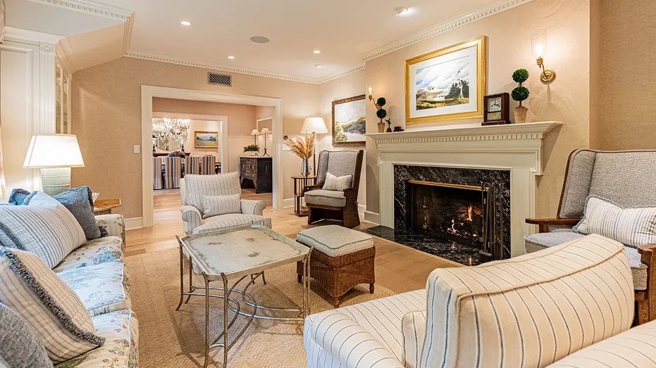 The living room has a wood-burning fireplace.