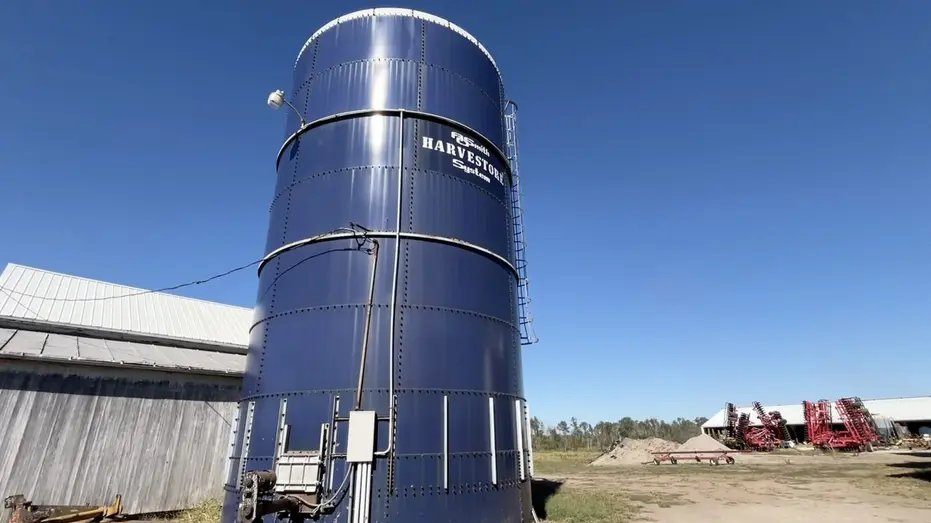Blue grain storage bin on a southern Illinois farm.