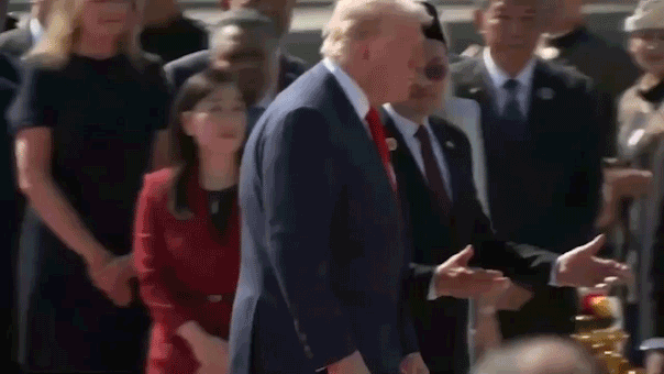 Trump dances with performers from Malaysia during Asia tour greeting.gif