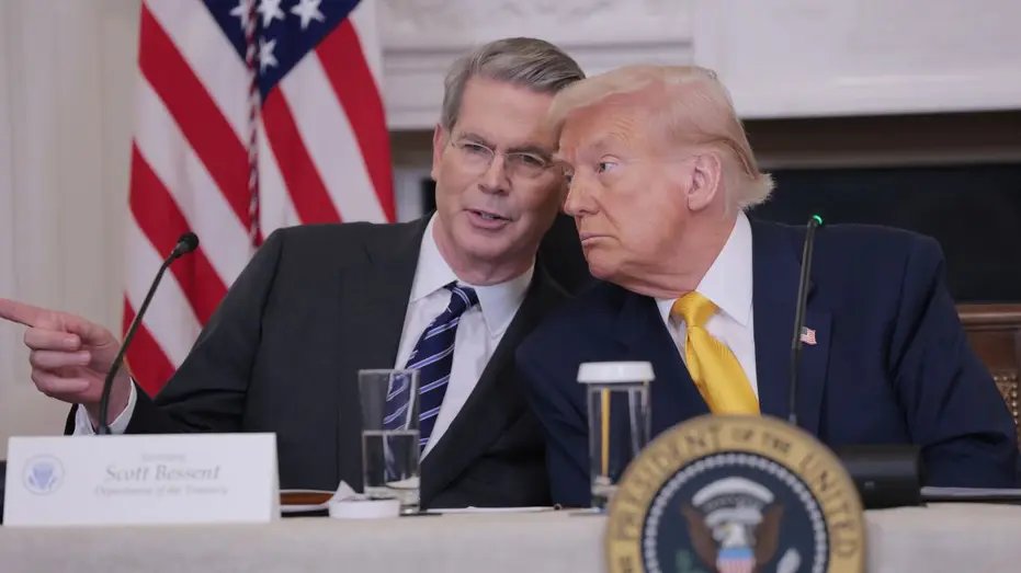 Scott Besant and Donald Trump in a meeting