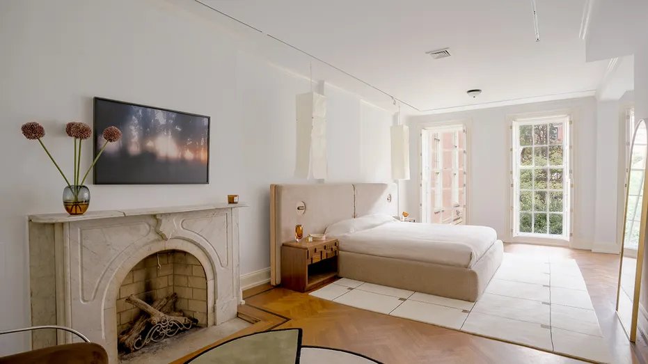 The master bedroom has a fireplace.