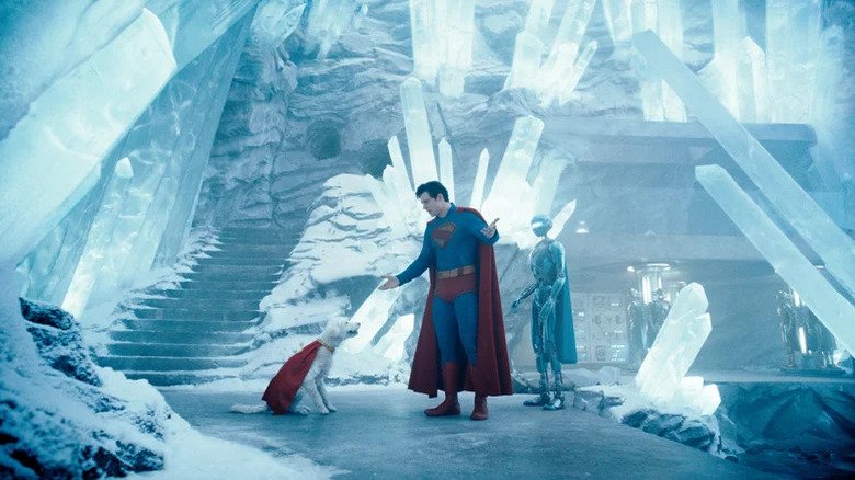 David Corenswet as Superman standing in the Fortress of Solitude talking to Krypto in Superman