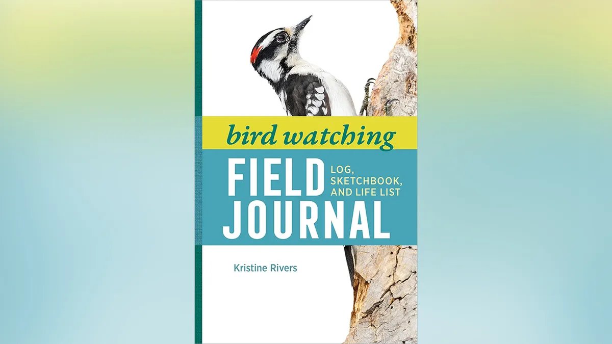 Birdwatching field diary book with a bird on the cover.