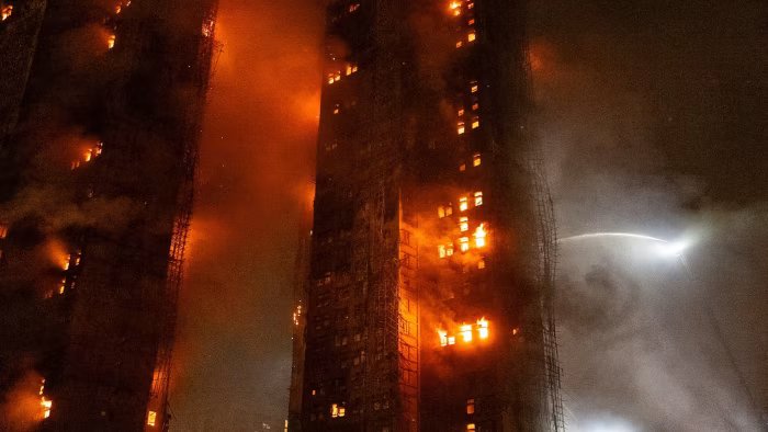 1764209965 Fire in Hong Kong apartment complex leaves 44 dead and.jpg