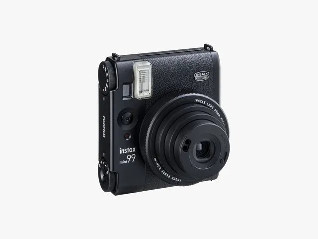 Front view of a black instant film camera with extended lens