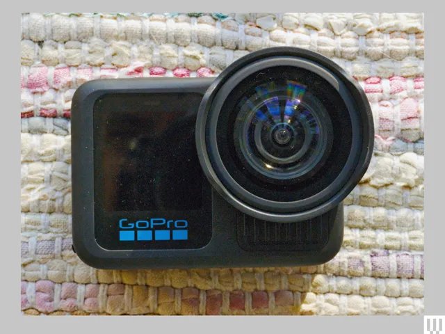 GoPro Hero 13 Black is a compact camera with a digital screen on the left and a circular lens on the right