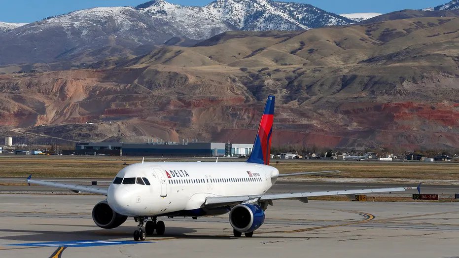 Delta Air Lines airliner taxi at Salt Lake City International Airport