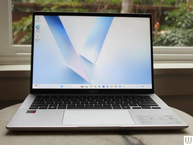 Image may contain: computer, electronics, laptop and pc