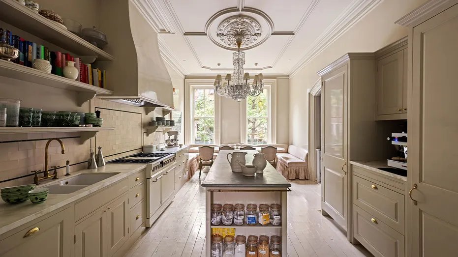 The stunning kitchen features plenty of storage space