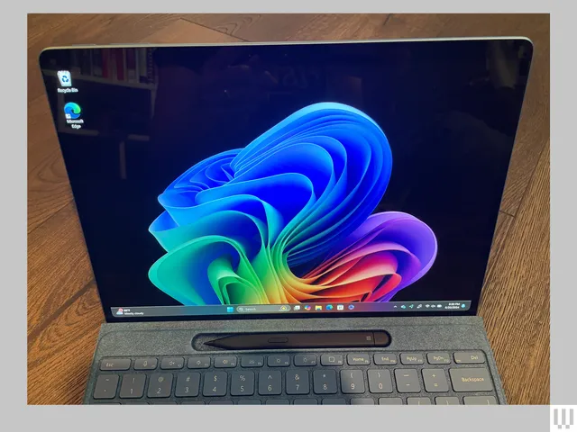 Close-up of a tablet screen and a pen slot just above the keyboard