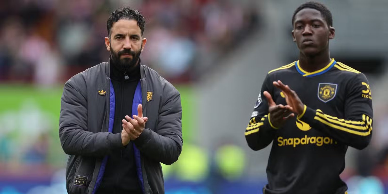 Manchester United coach Ruben Amorim and Kobe Maino look depressed after the match