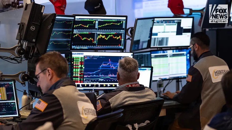 Traders on the floor of the New York Stock Exchange.