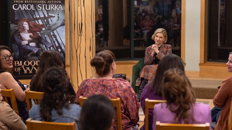 Rhea Seehorn's Carol Sturka hosts a live reading of her book at Pluribus