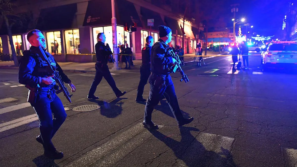 Police patrol in a neighborhood in Providence, Rhode Island