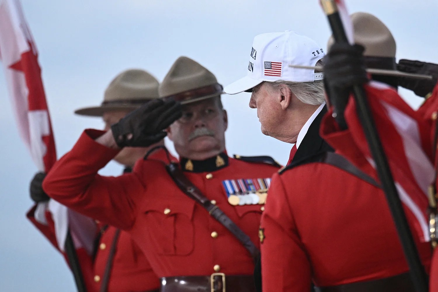 Trump looks at Canadian security as he steps off of Air Force One.
