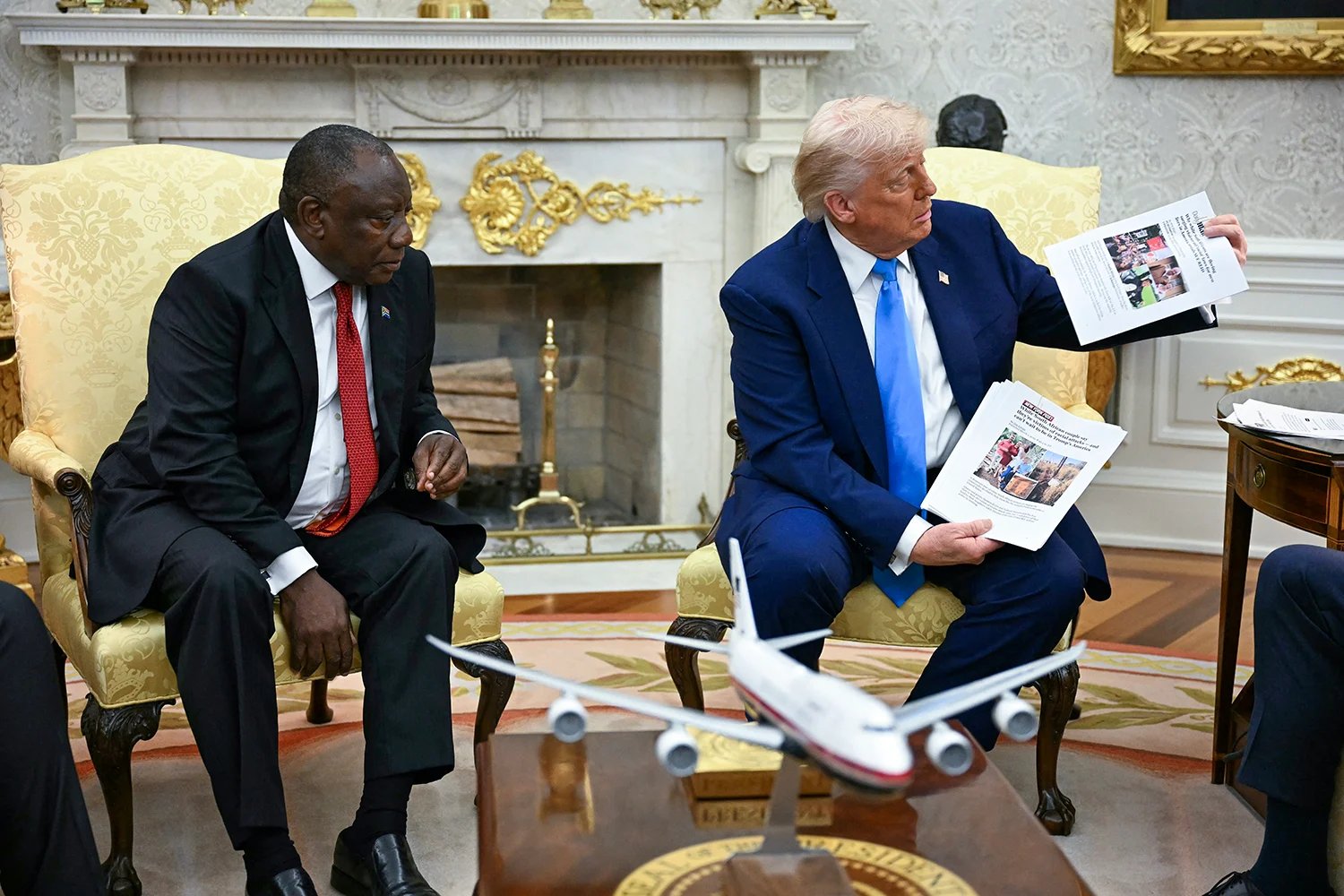 Trump shows pictures as he meets with South African President Cyril Ramaphosa