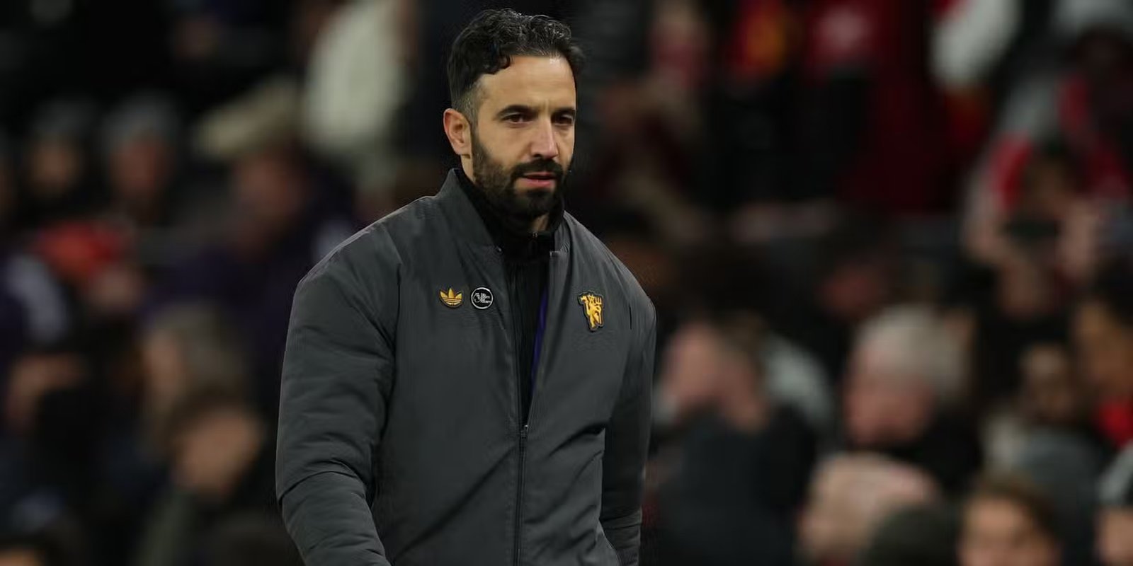 Manchester United coach Ruben Amorim left the first half