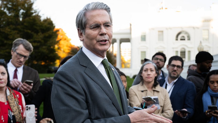 Scott Besant takes reporters' questions outside the White House.