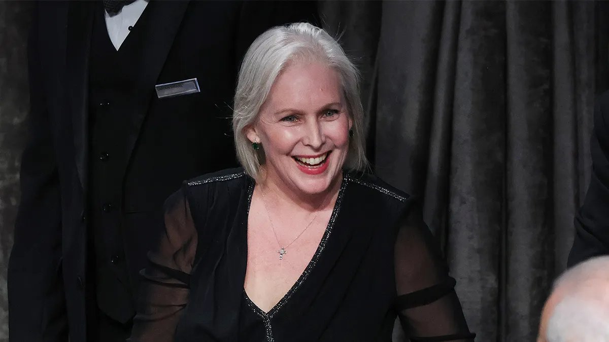 Kirsten Gillibrand wears a black dress.