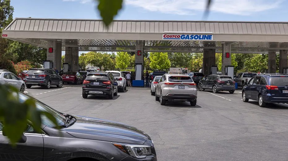 Customers line up at a Costco gas station in Concord, California, U.S., on Wednesday, June 22, 2022. <a href=
