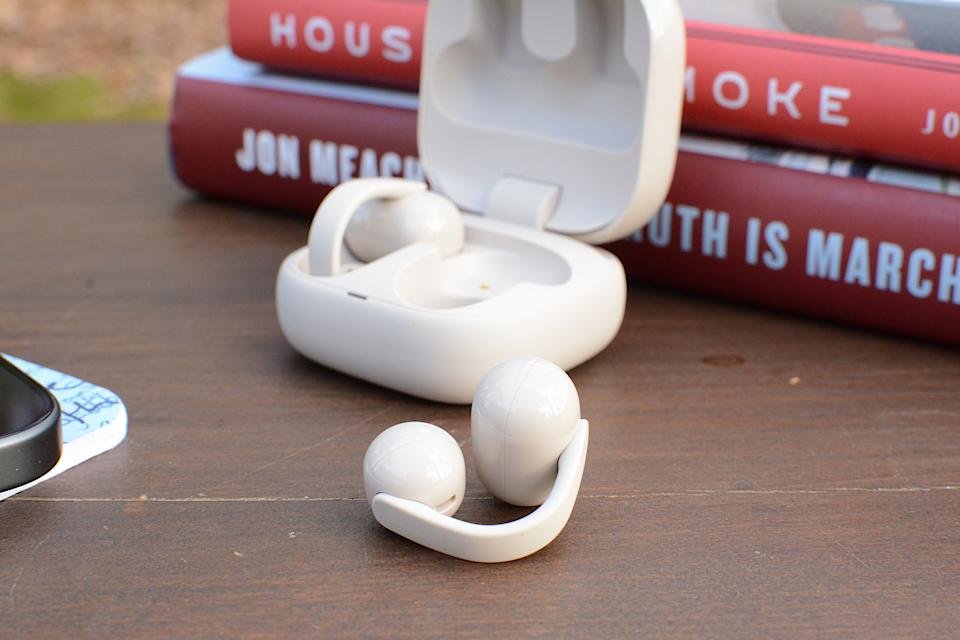 The controls are located along the connector between the two cylindrical housings