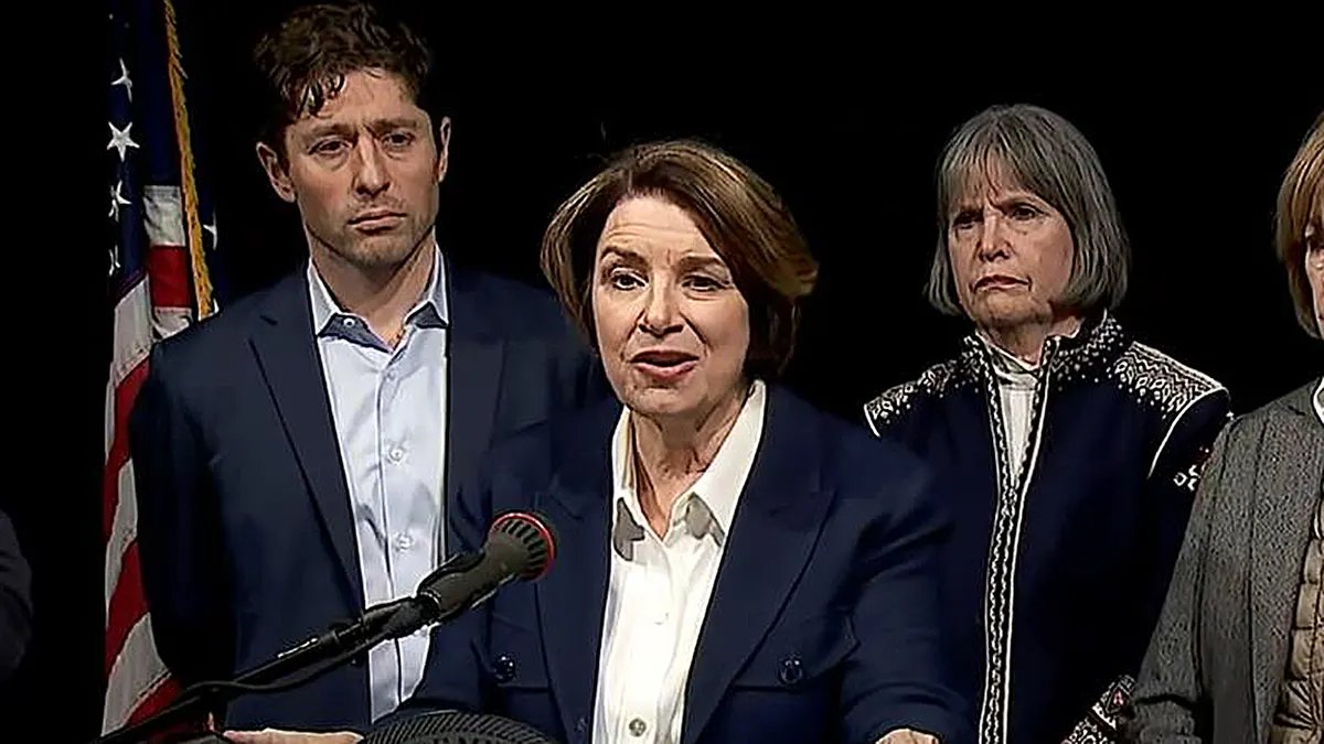 Amy Klobuchar speaks at a press conference with Jacob Frey