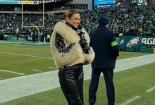 1769411080 Erin Andrews Rocks Another Fur Coat During NFC Championship Game.jpg