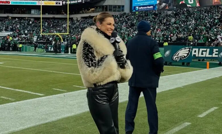1769411080 Erin Andrews Rocks Another Fur Coat During NFC Championship Game.jpg