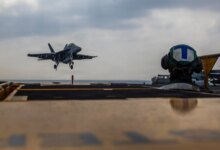 1769473038 Carrier strike group with stealth fighters arrives in Mideast as.jpg
