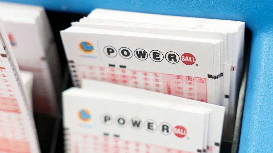 Stacks of empty Powerball playing cards are arranged on a lottery table at a well-known California liquor store.