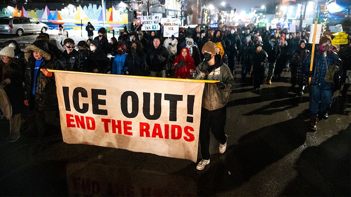 People walk during a protest after the killing of Renee Nicole Judd