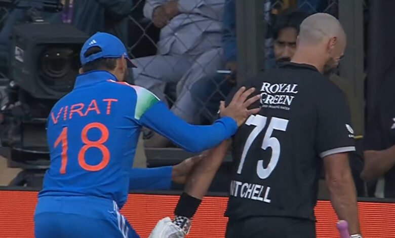 Virat Kohli physically pushes Daryl Mitchell off field after Kiwi.jpg